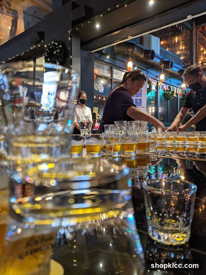 Bar Interior with Staff Preparing Drinks
