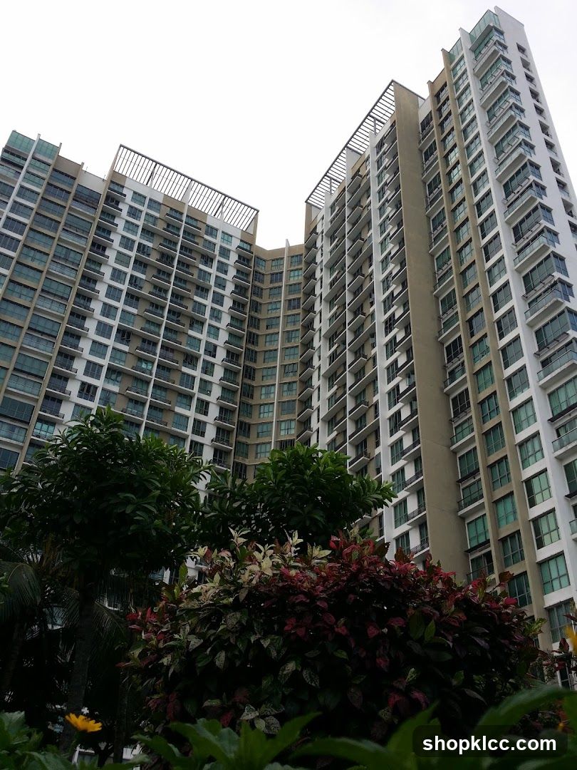 High-rise residential buildings with greenery in foreground