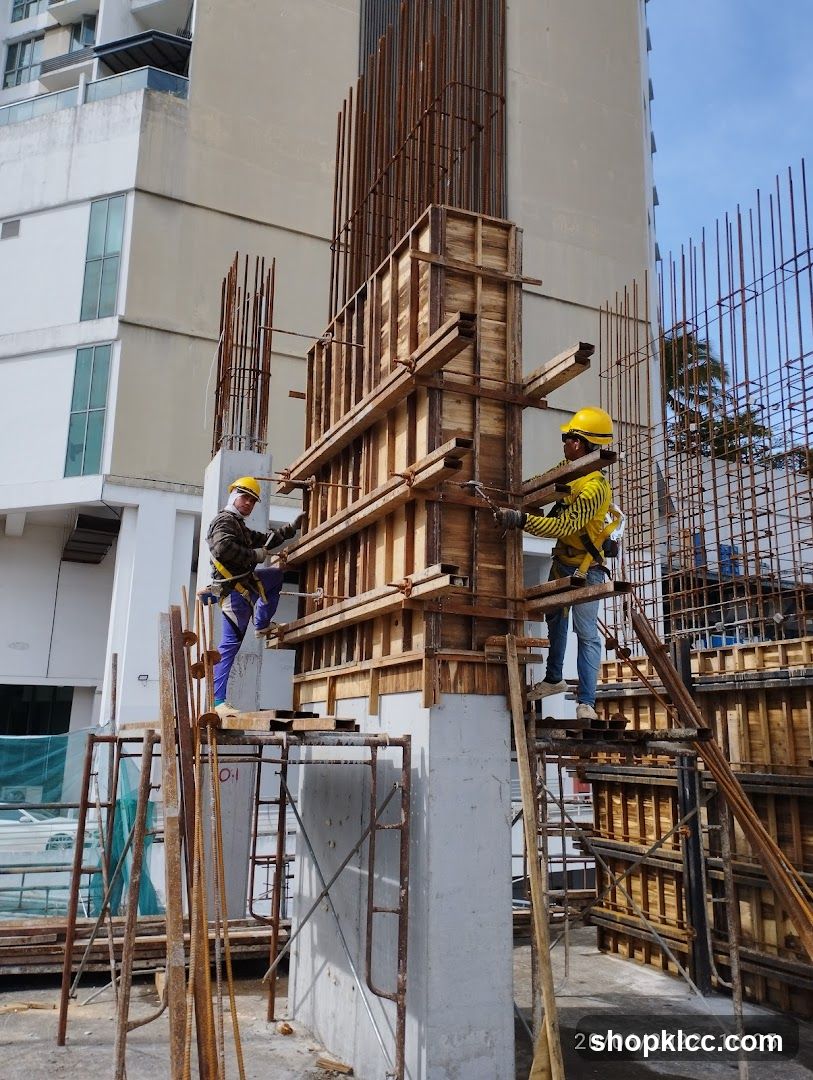 Construction Site Workers on Scaffolding