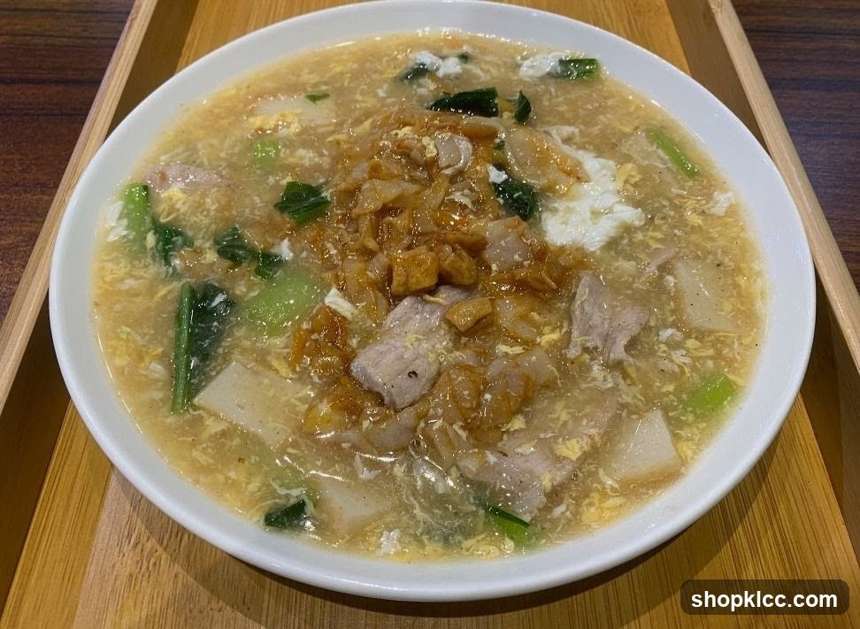 Bowl of Soup with Meat and Vegetables