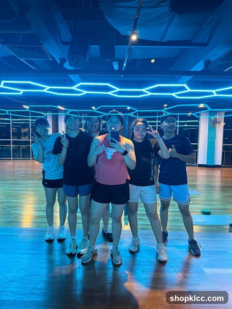 Group selfie in fitness studio