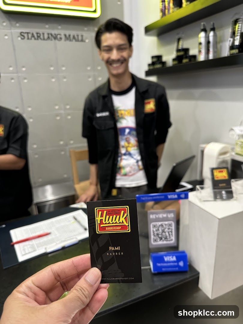 Barber Shop Interior with Staff and Business Card