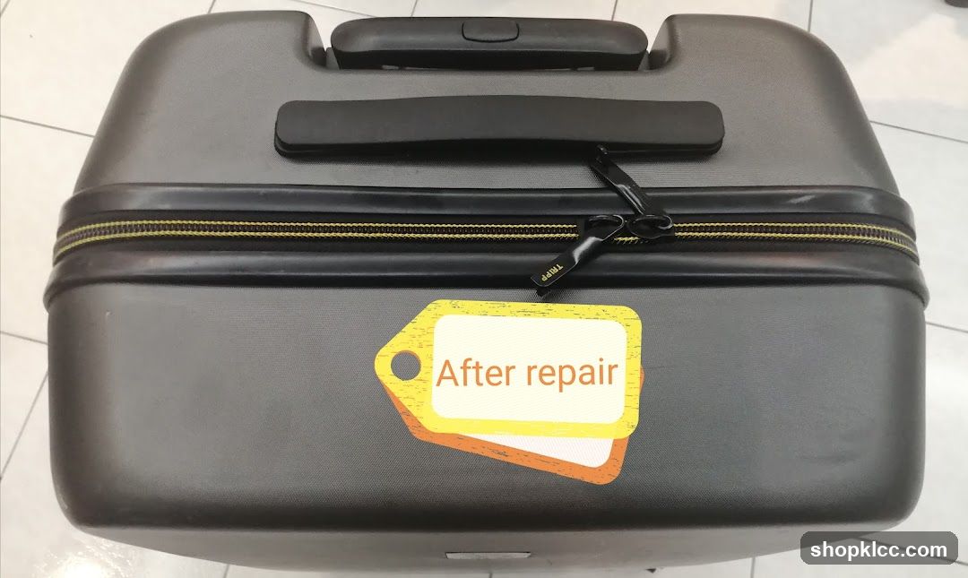 Suitcase with "After repair" tag