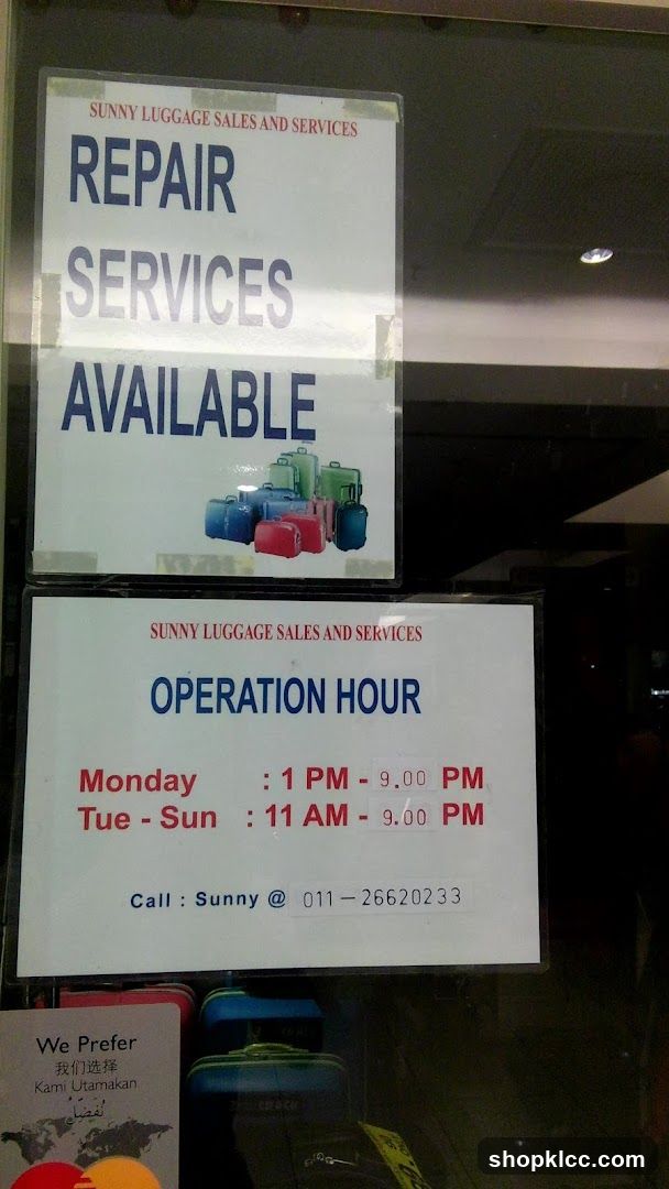Sunny Luggage Sales and Services Signs