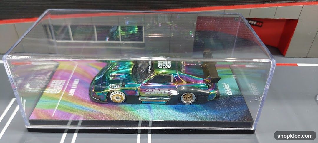 Die-cast car in display case
