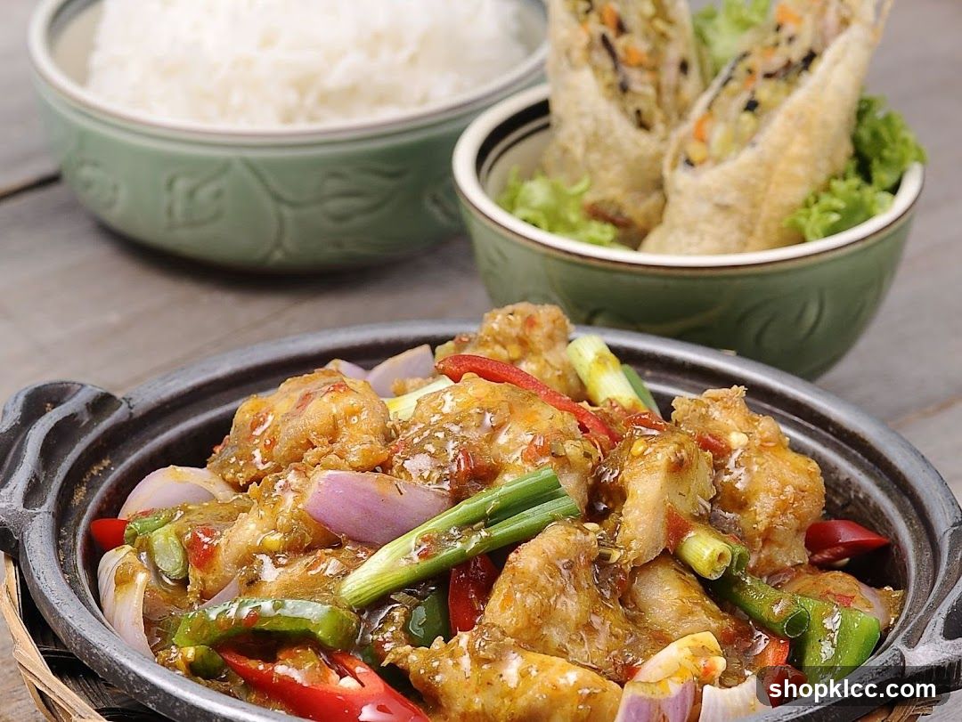Stir-fried dish with rice and spring rolls