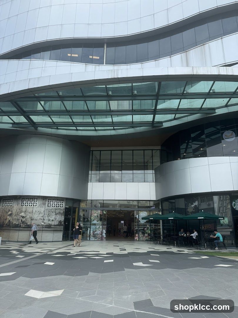 Modern Building Entrance with Outdoor Seating