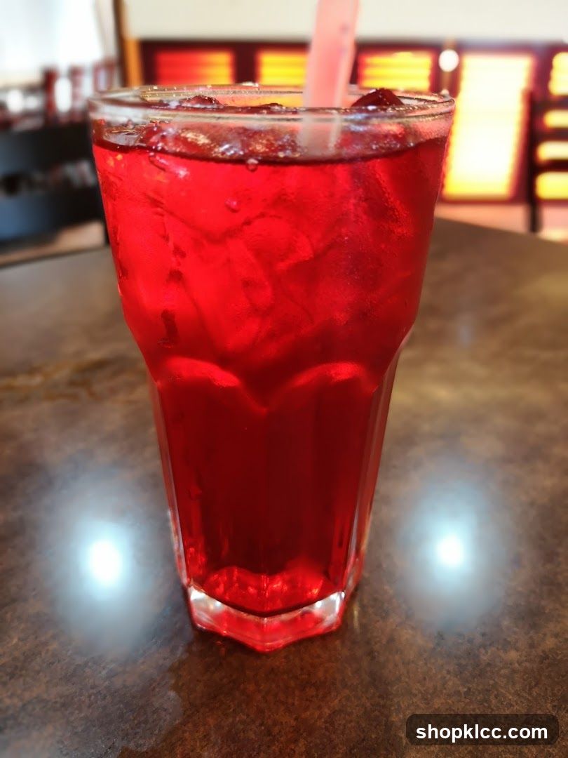 Red Drink with Ice and Straw