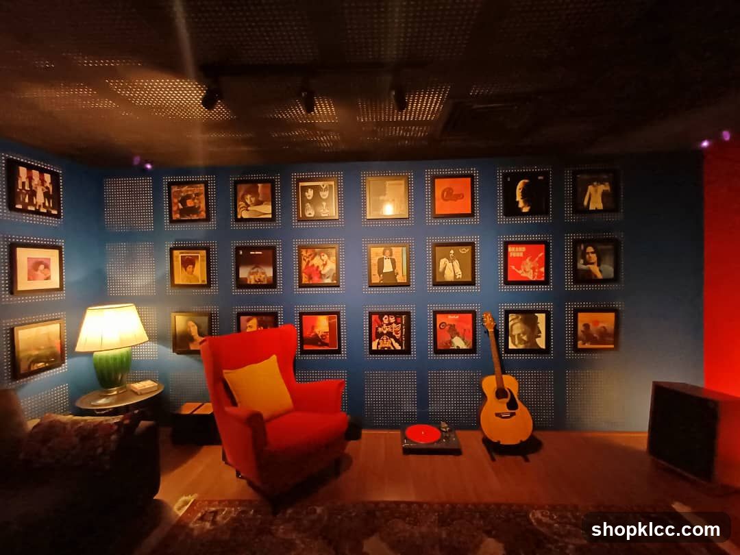 Music-themed room with framed records and guitar