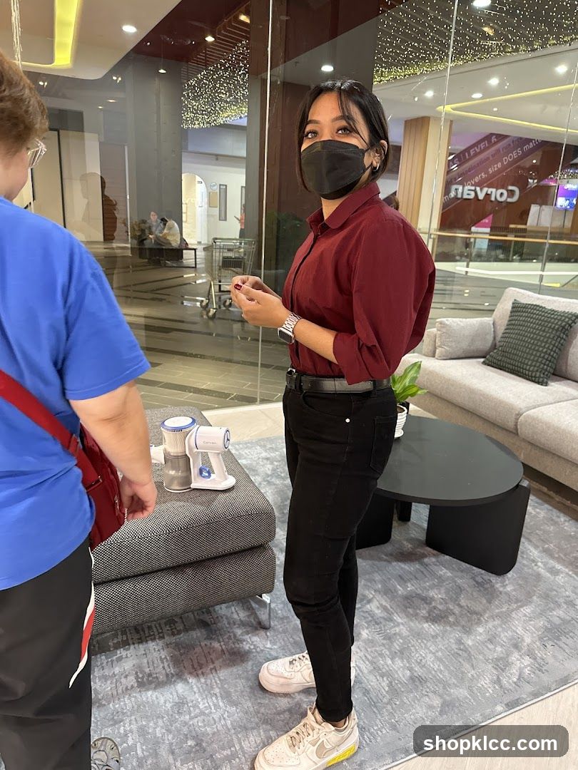 Woman in Maroon Shirt and Black Pants