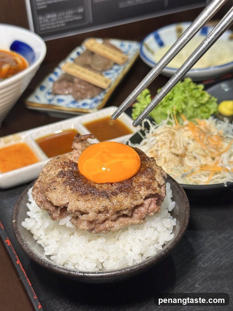 Hamburger Steak with Egg Yolk on Rice