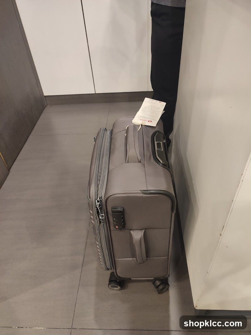 Gray Suitcase with Tag