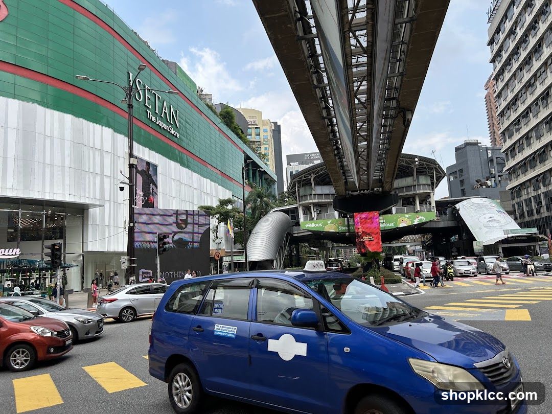 Busy City Street with Department Store and Monorail