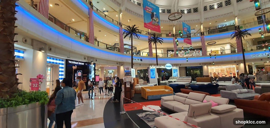 Interior of a shopping mall with furniture displays