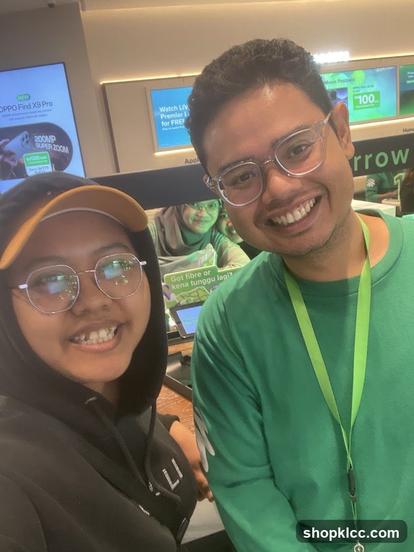 Two people smiling in a store
