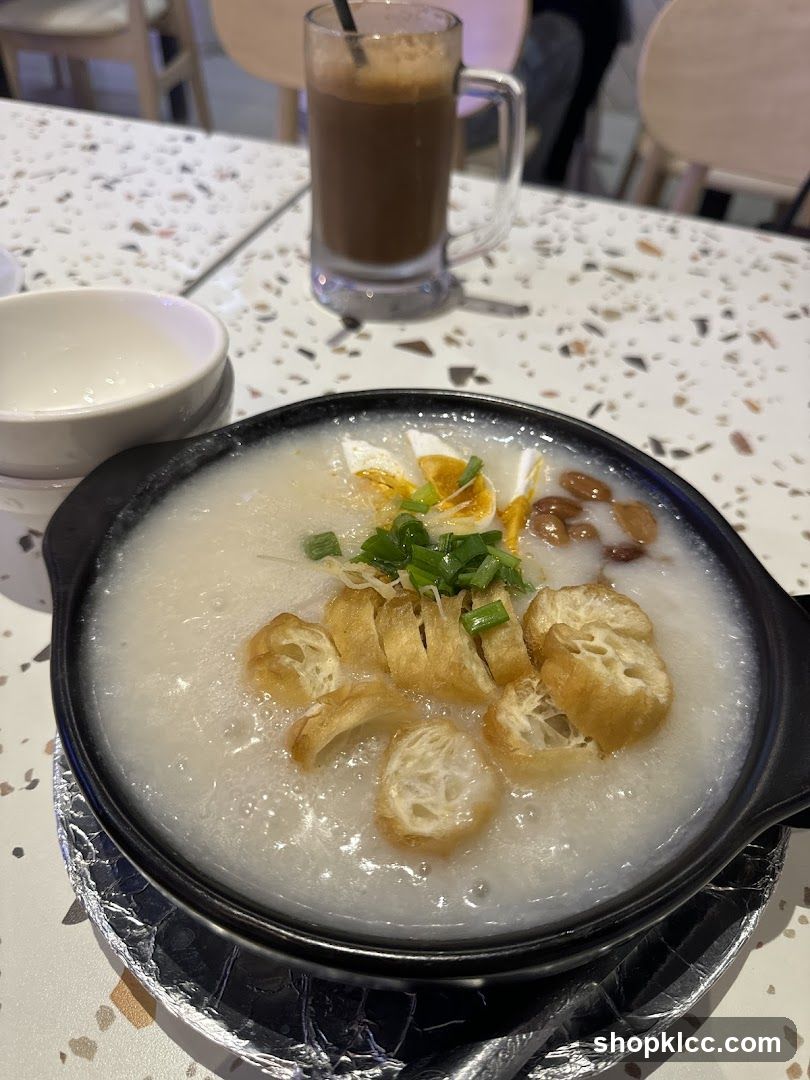 Congee with toppings and a drink