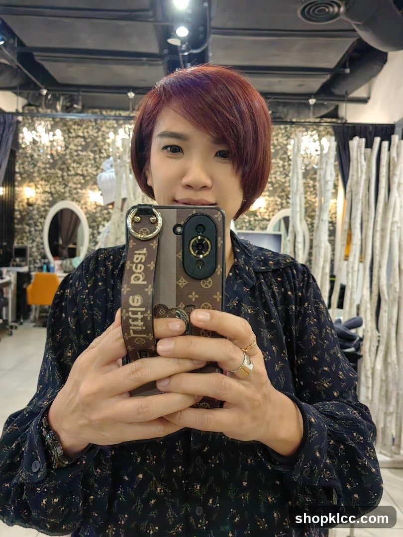 Woman taking a selfie in a salon