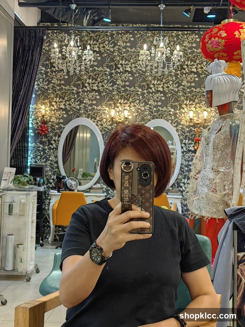 Salon Interior with Woman Taking Selfie