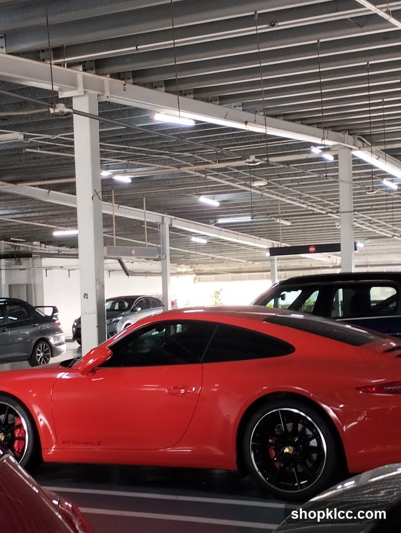 Red Porsche 911 Carrera S in Parking Garage