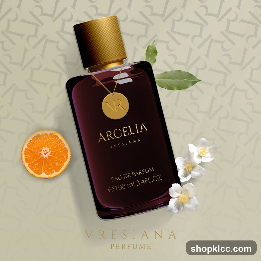 Perfume Bottle with Orange Slice and Flowers