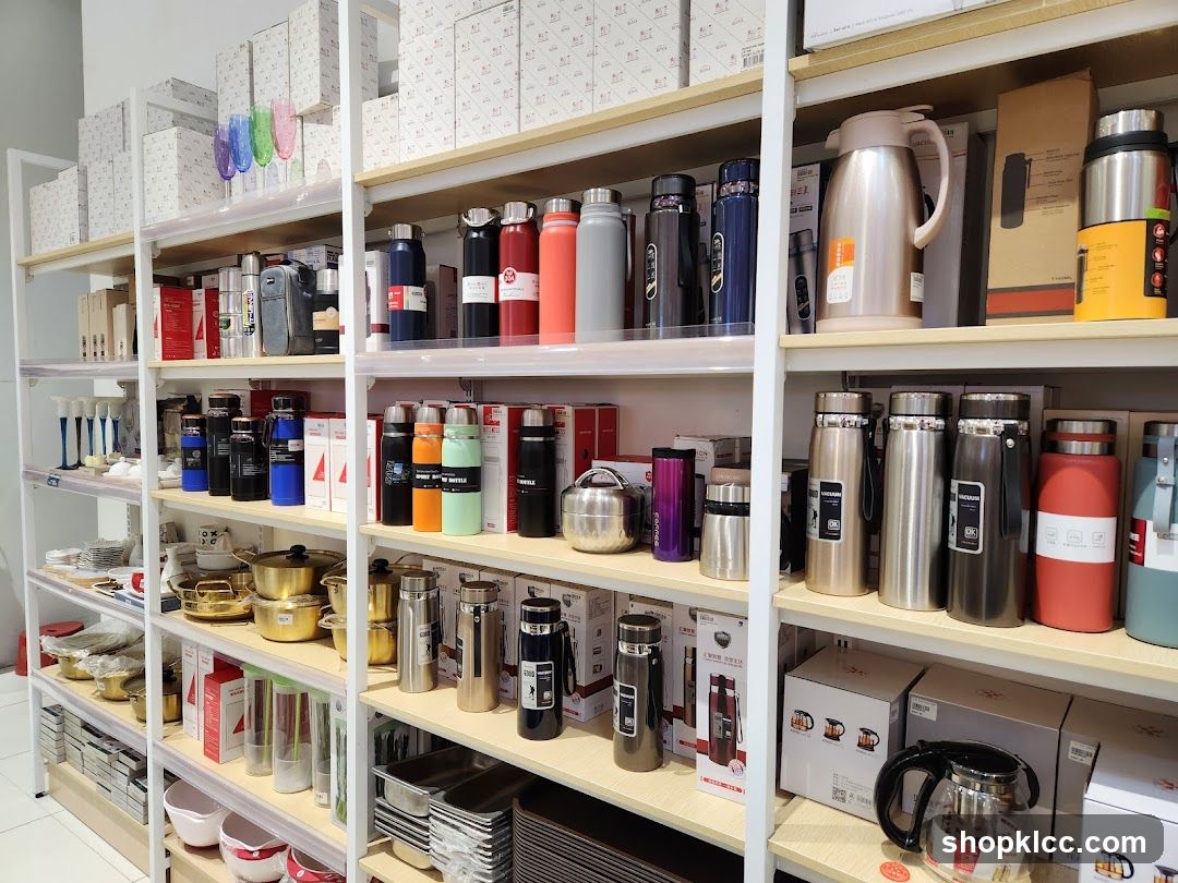 Shelves stocked with various kitchenware and drinkware