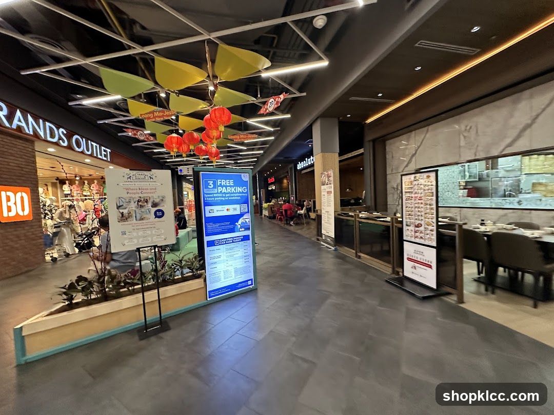 Shopping Mall Interior with Storefronts and Dining Area
