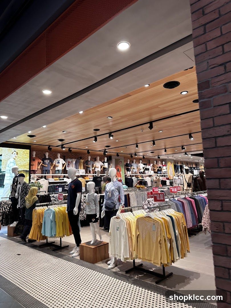 Clothing store interior with mannequins and apparel