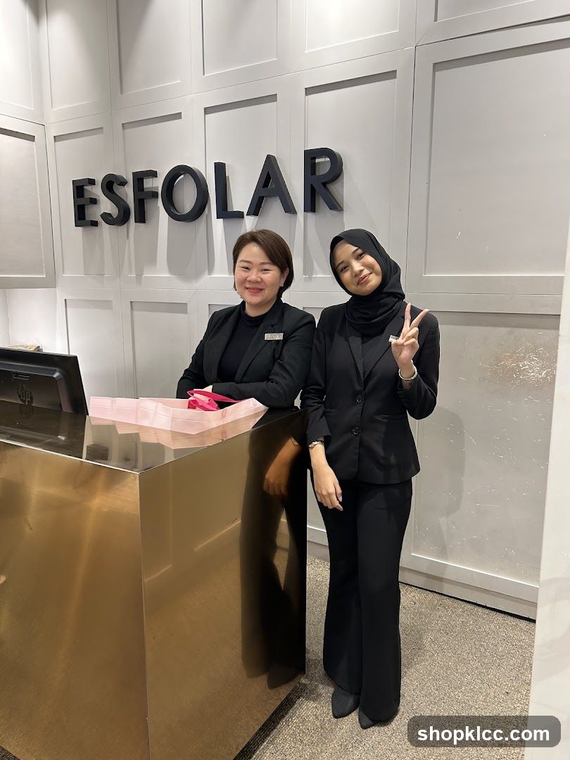 Two women at a reception desk
