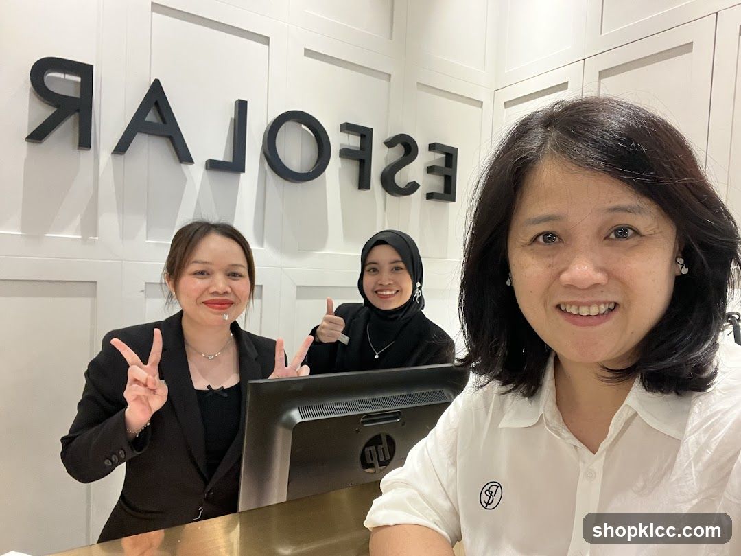 Three women smiling at the camera