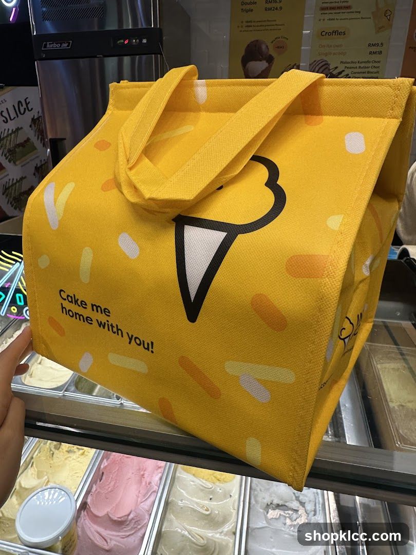 Yellow tote bag with ice cream cone graphic