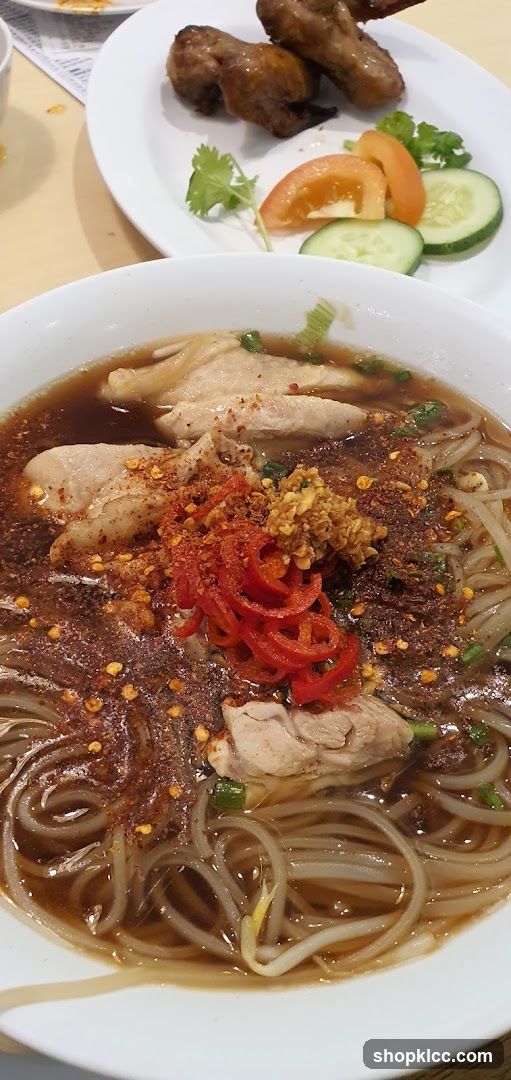 Noodle Soup with Chicken and Side of Meat Skewers