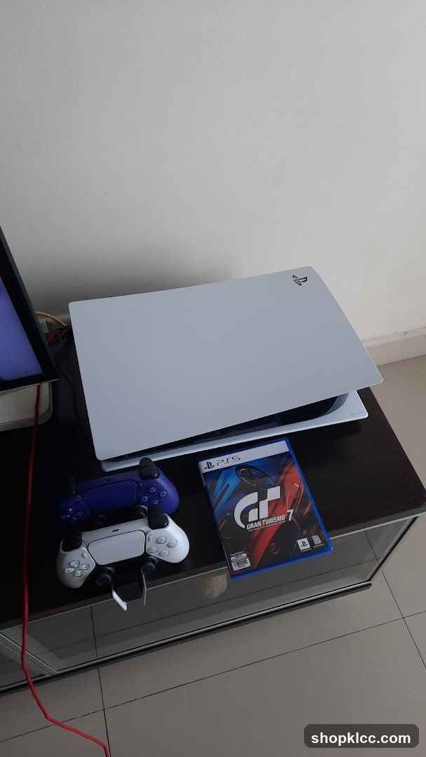PlayStation 5 Console with Controllers and Game
