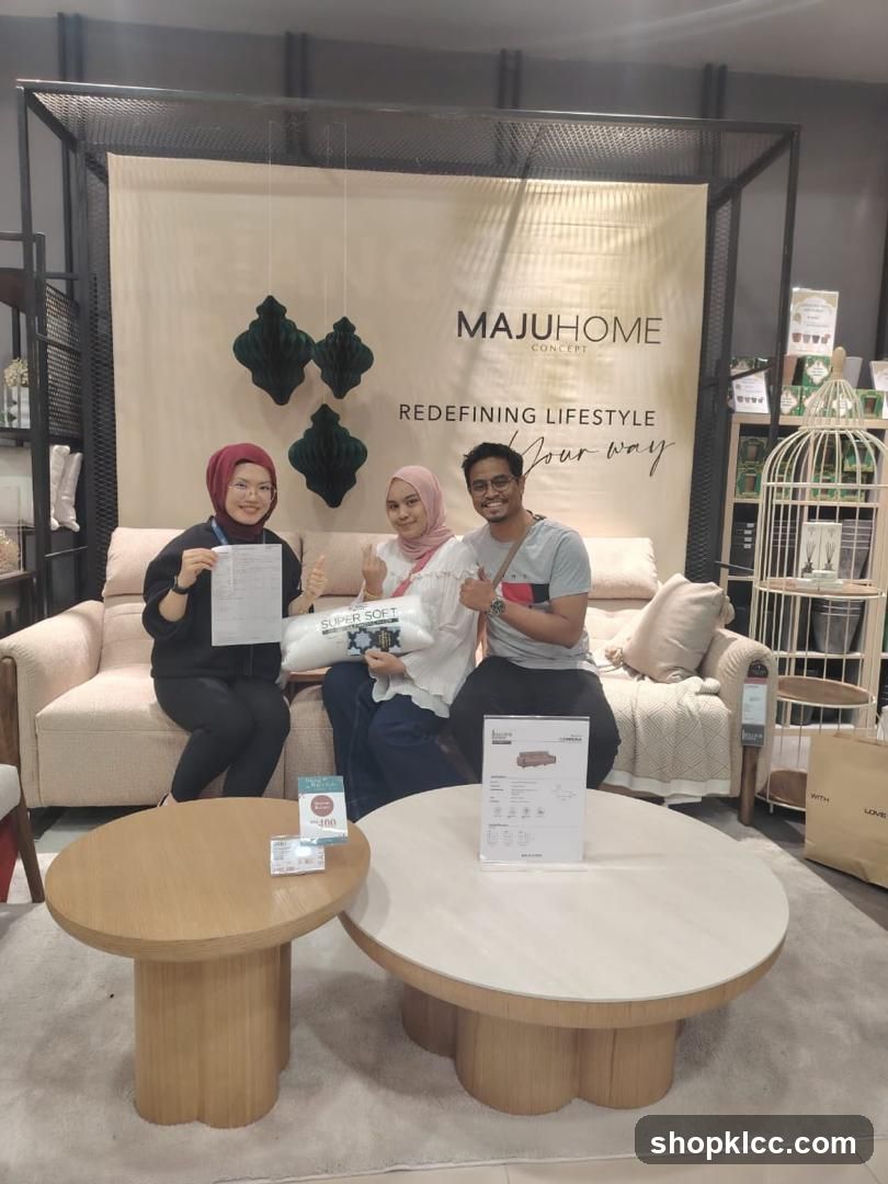 People posing in a furniture store