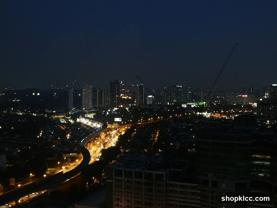Night Cityscape with Highway and Skyscrapers