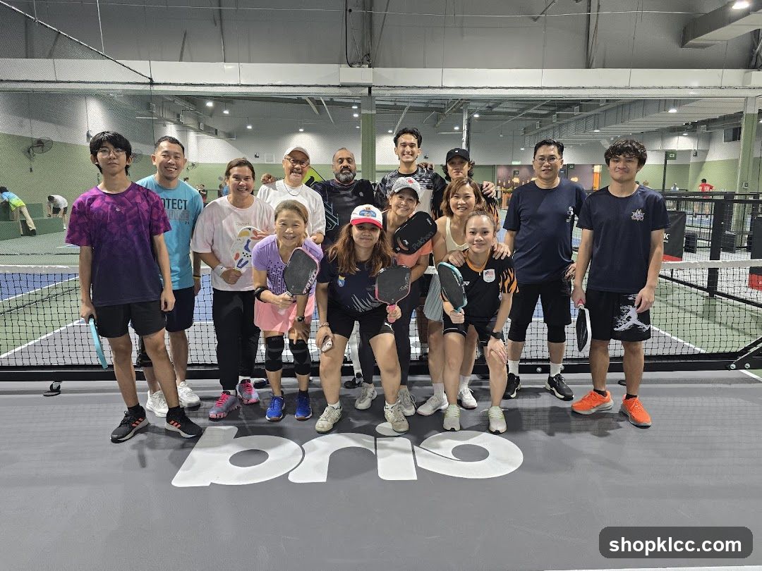 Group photo at indoor pickleball court
