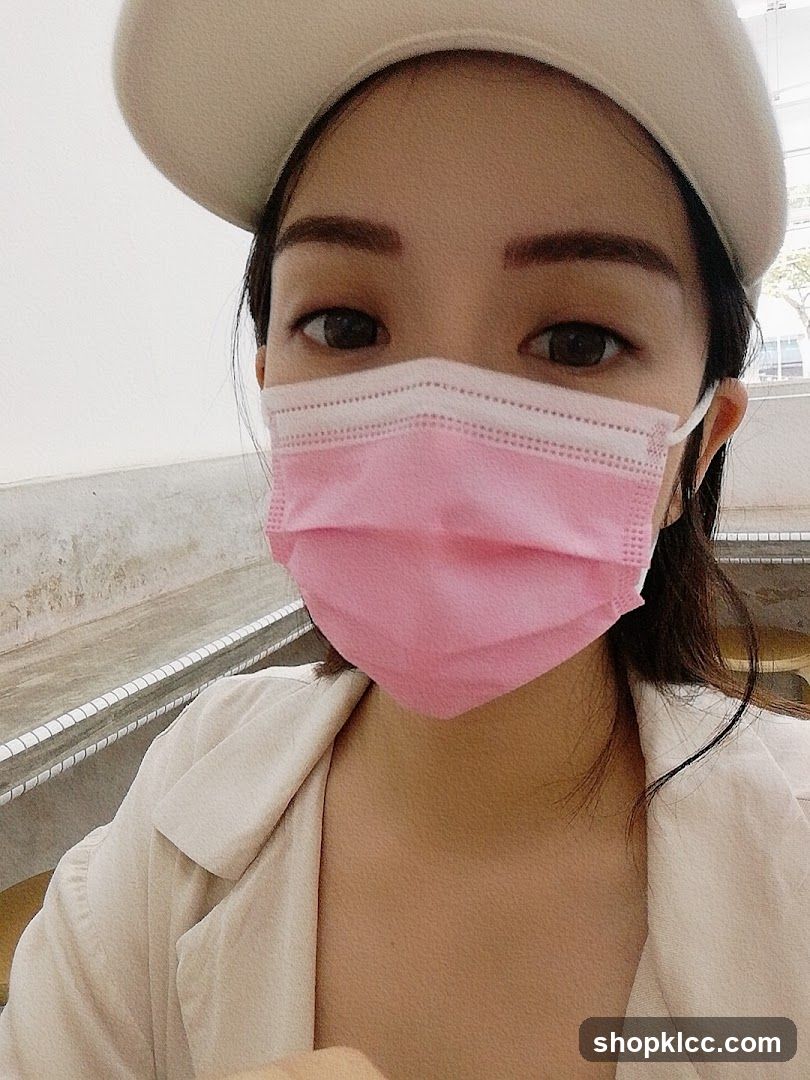 Selfie with pink mask and hat