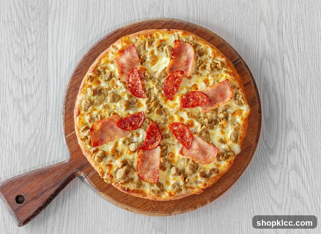 Pizza with Sausage and Pepperoni on Wooden Board