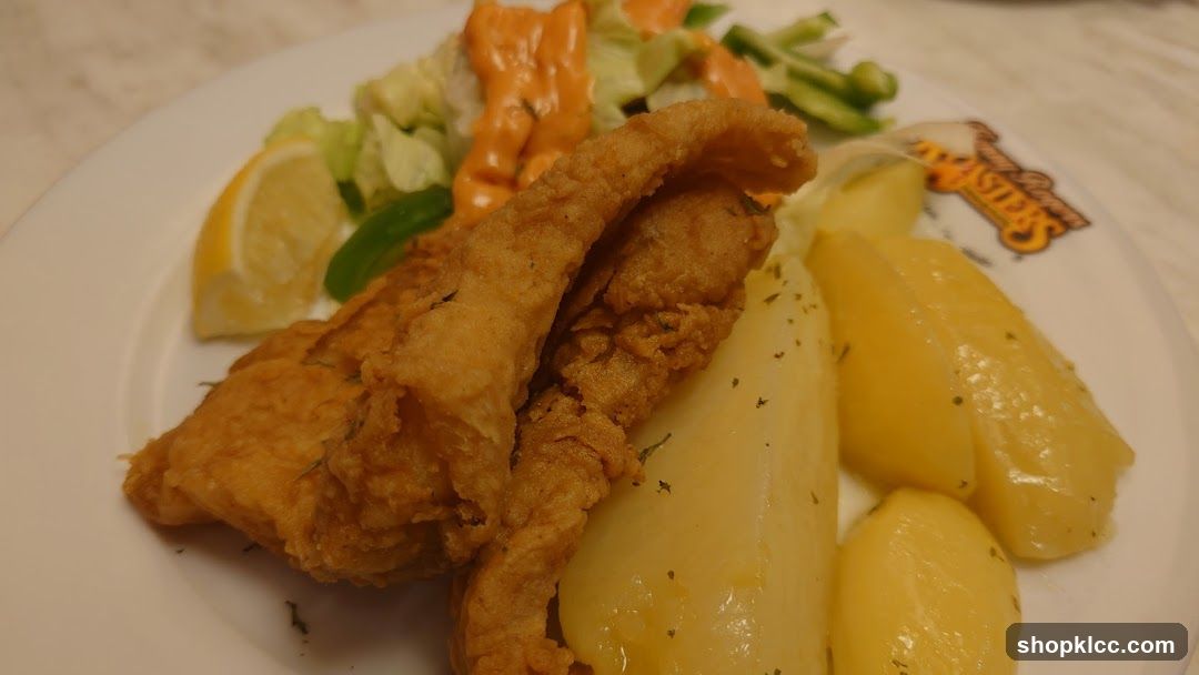 Fried Fish with Potatoes and Salad