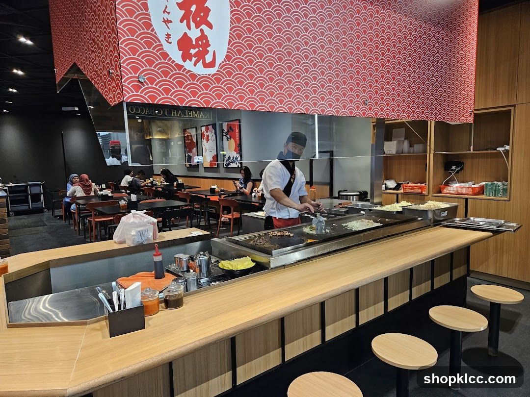 Restaurant Interior with Chef Cooking