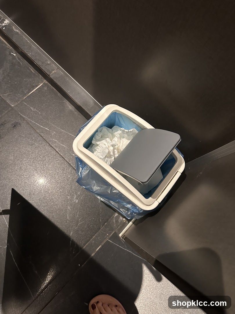 Trash can with crumpled paper