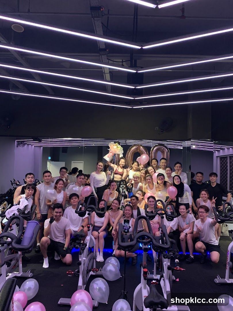 Group celebrating in a spin class