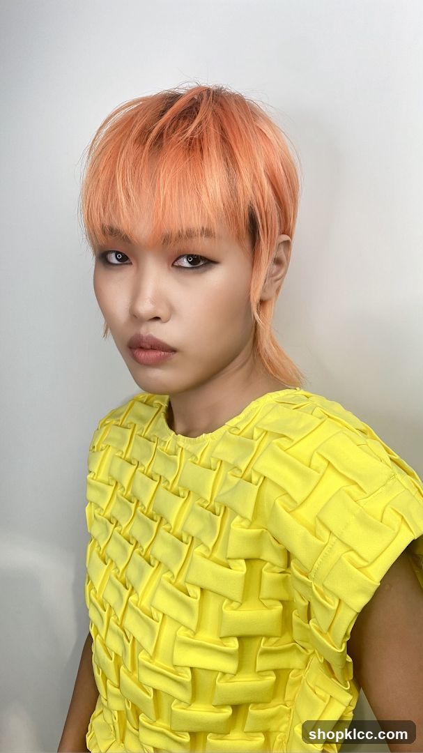 Model with Orange Hair and Yellow Top