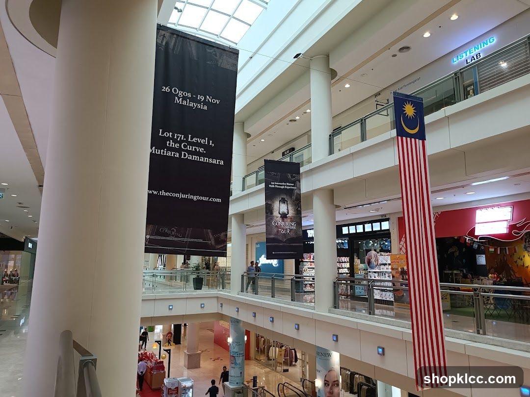 Shopping Mall Interior with Banners and Storefronts