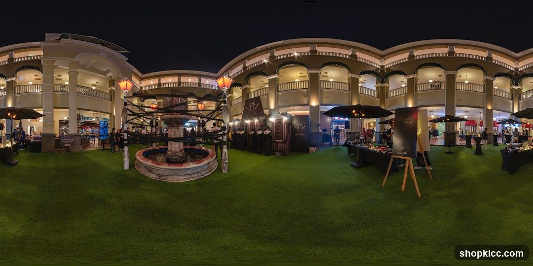 Evening Market Scene with Fountain and Stalls
