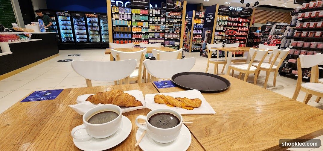 Coffee Shop Interior with Croissants and Coffee