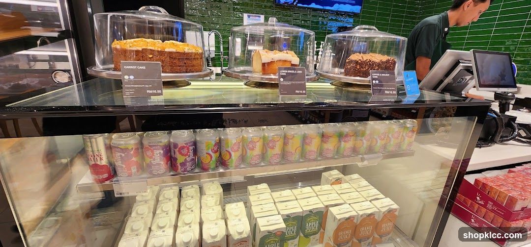 Cafe Display Case with Cakes and Drinks