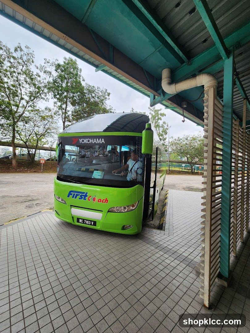 Green Bus at Station