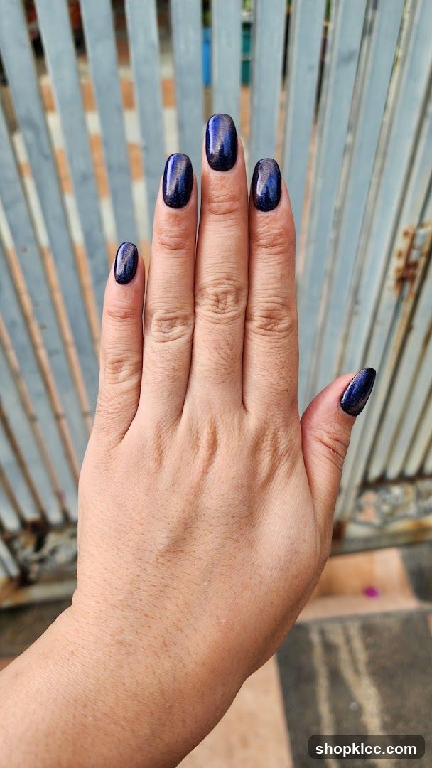 Hand with Dark Blue Nail Polish