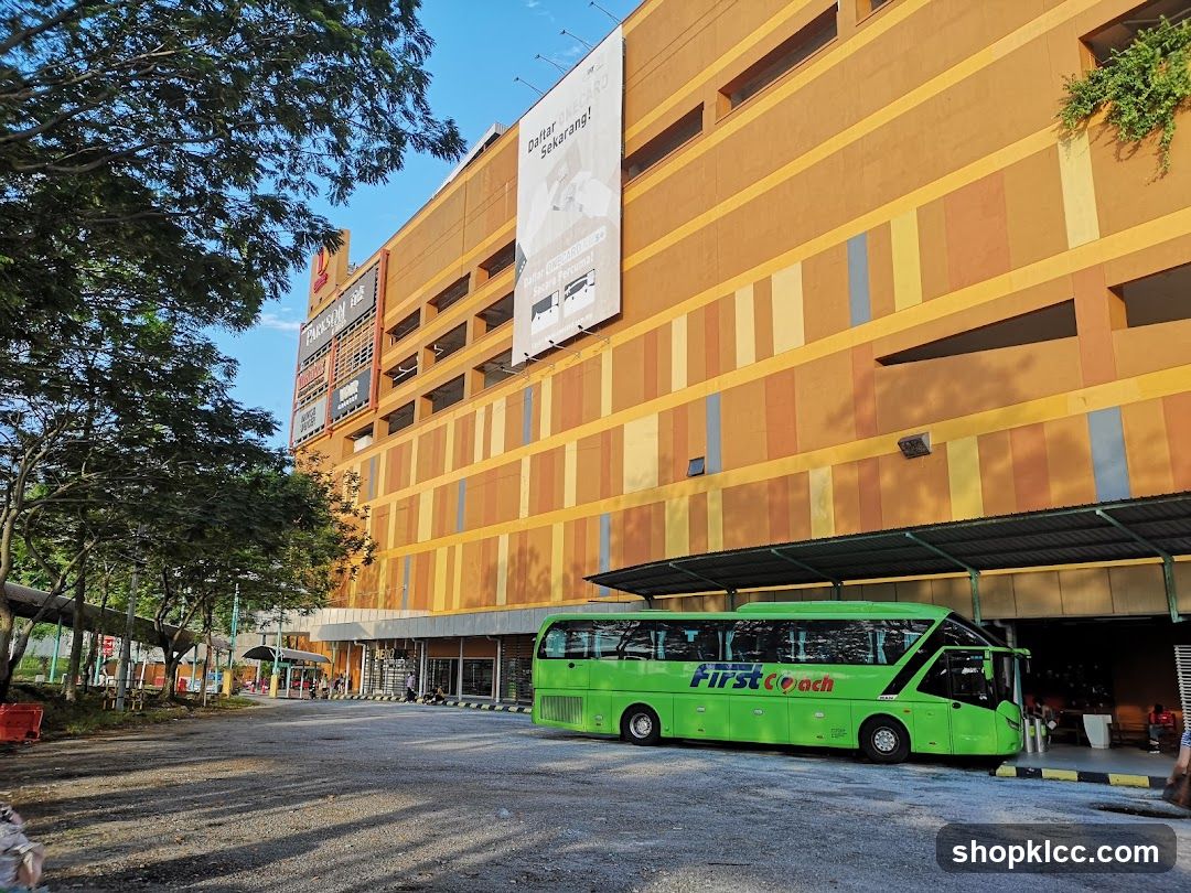 First Coach Bus Outside Shopping Center