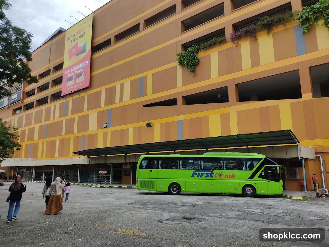 Parking Area with Bus and Building Facade